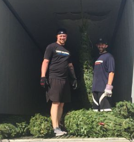 Sean and Nick Unloading Trees